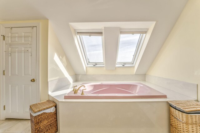 815 Battlefield Park Dr, Dalton, GA 30720 - bathroom featuring a skylight and a bathing tub