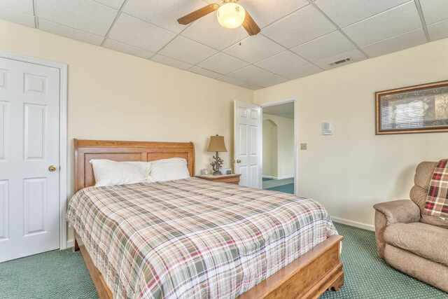 815 Battlefield Park Dr, Dalton, GA 30720 - bedroom with dark colored carpet, a paneled ceiling, and ceiling fan