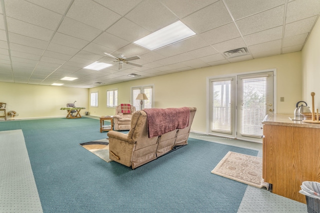 815 Battlefield Park Dr, Dalton, GA 30720 - living room featuring a drop ceiling, plenty of natural light, ceiling fan, and carpet flooring
