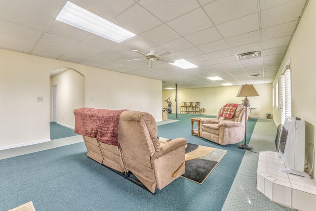 815 Battlefield Park Dr, Dalton, GA 30720 - living room featuring ceiling fan, heating unit, and a drop ceiling