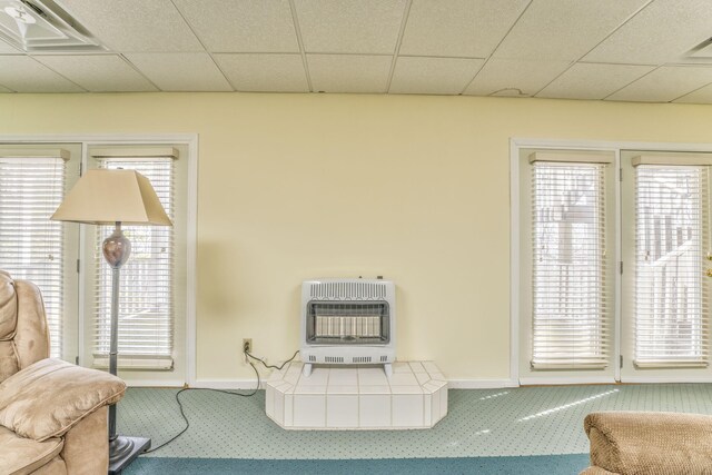 815 Battlefield Park Dr, Dalton, GA 30720 - room details featuring a paneled ceiling, carpet floors, and heating unit
