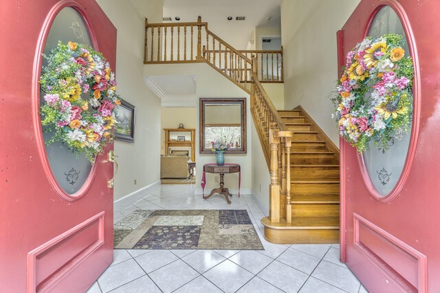 815 Battlefield Park Dr, Dalton, GA 30720 - foyer entrance with light tile patterned floors and a towering ceiling
