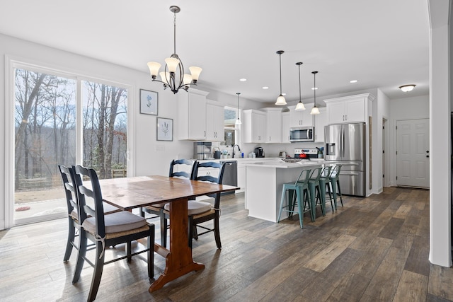 4700 Creek Point Ln, Signal Mountain, TN 37377 - dining area featuring dark wood-style flooring, healthy amount of natural light, a chandelier, and recessed lighting