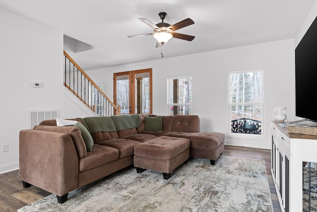 4700 Creek Point Ln, Signal Mountain, TN 37377 - living area with healthy amount of natural light, wood finished floors, a ceiling fan, and stairway