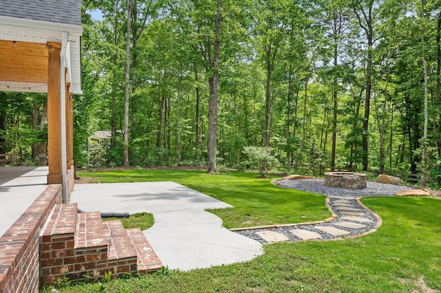 4700 Creek Point Ln, Signal Mountain, TN 37377 - view of green lawn with an outdoor fire pit and a patio area
