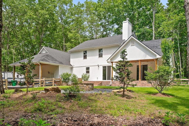 4700 Creek Point Ln, Signal Mountain, TN 37377 - back of property with a chimney, roof with shingles, and a porch