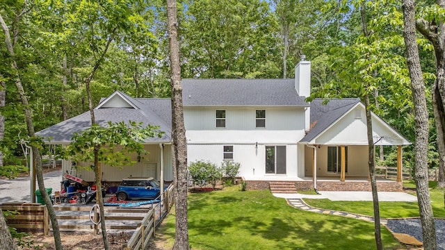 4700 Creek Point Ln, Signal Mountain, TN 37377 - back of property featuring a shingled roof, a chimney, a yard, and covered porch