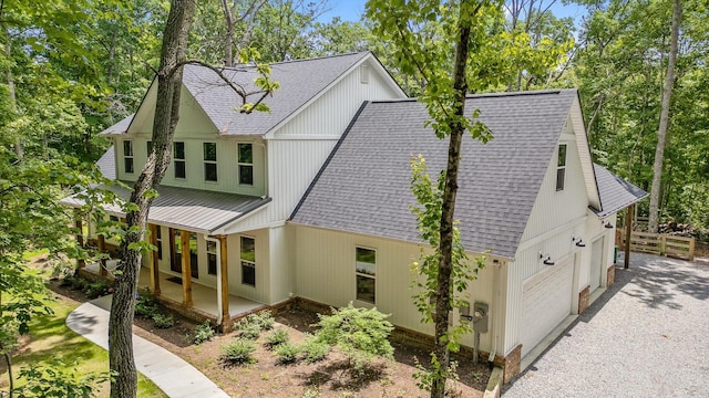 4700 Creek Point Ln, Signal Mountain, TN 37377 - view of front of house featuring a shingled roof, a garage, and driveway