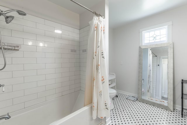 bathroom with toilet, baseboards, shower / bath combination with curtain, and tile patterned floors