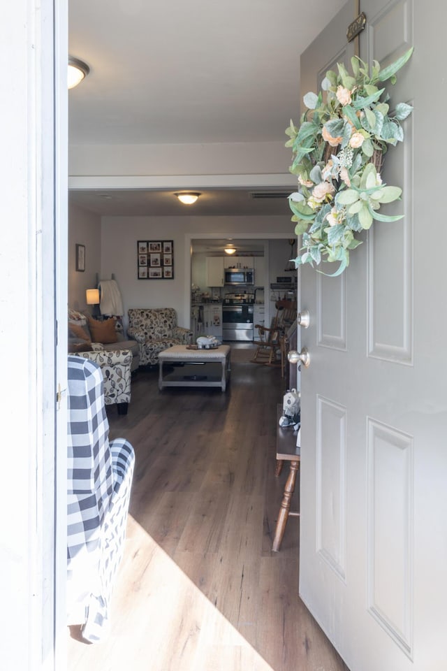 entrance foyer with hardwood / wood-style floors