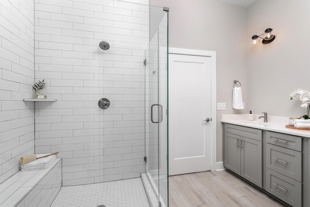 bathroom featuring vanity and walk in shower