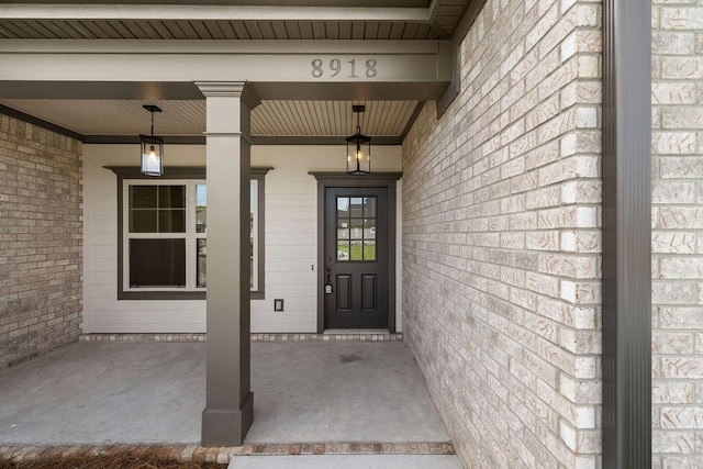 8918 Knolling Lp Unit 32, Ooltewah, TN 37363 - view of exterior entry featuring covered porch