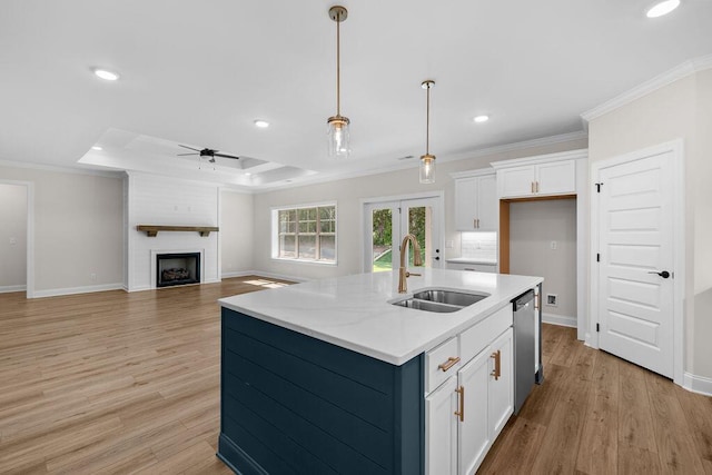 8918 Knolling Lp Unit 32, Ooltewah, TN 37363 - kitchen with a sink, white cabinetry, ceiling fan, a tray ceiling, and crown molding