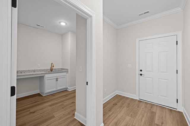 8918 Knolling Lp Unit 32, Ooltewah, TN 37363 - foyer featuring crown molding, light wood-style flooring, and baseboards