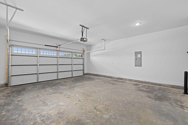 8918 Knolling Lp Unit 32, Ooltewah, TN 37363 - garage with baseboards, electric panel, and a garage door opener