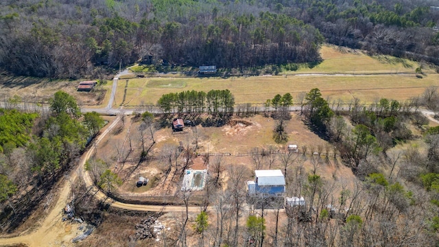 birds eye view of property featuring a rural view