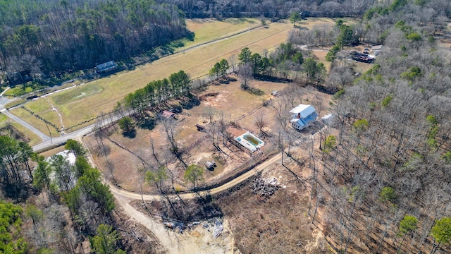 birds eye view of property featuring a rural view