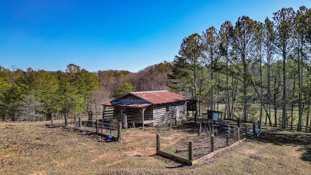 exterior space featuring an outbuilding