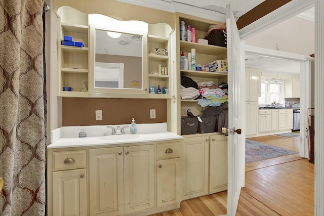 interior space featuring sink and light hardwood / wood-style flooring