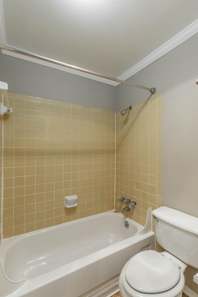 full bath featuring ornamental molding, tub / shower combination, and toilet