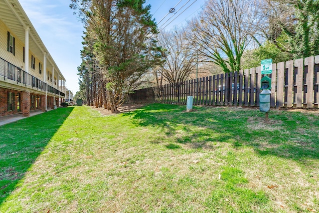 view of yard with fence