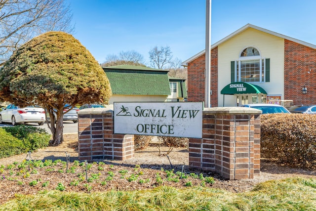 view of community sign