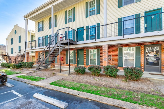 view of property featuring stairway