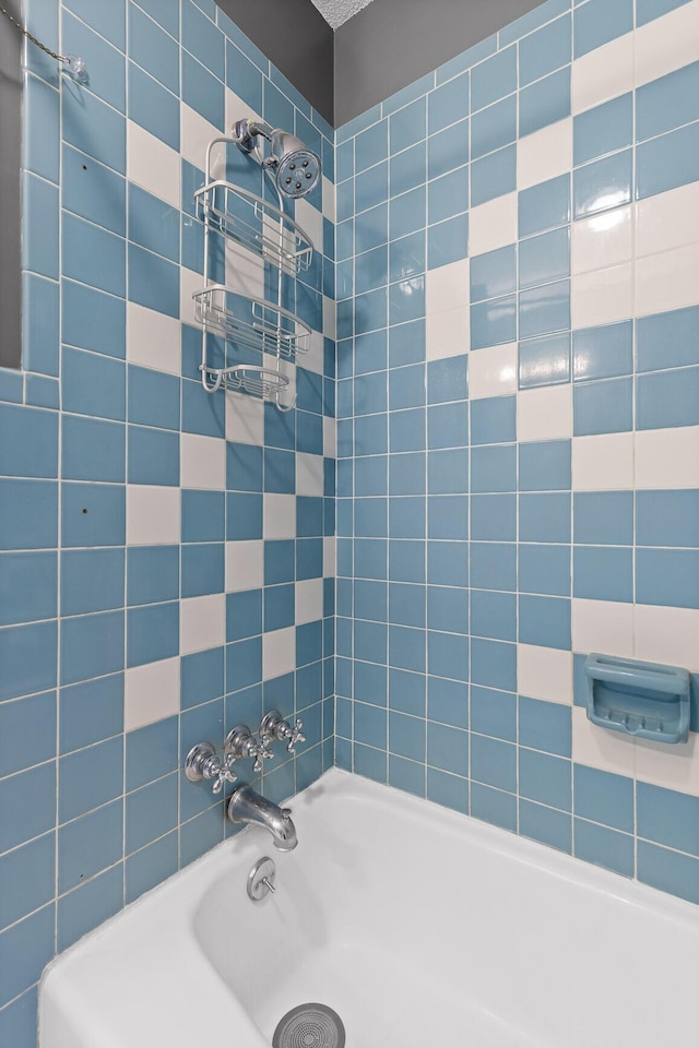 full bathroom featuring  shower combination