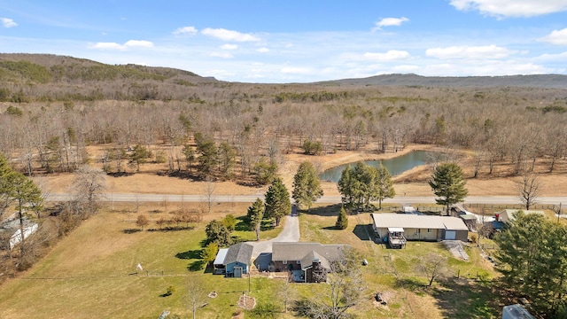 aerial view featuring a rural view and a water and mountain view