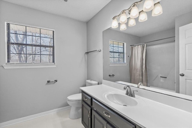 bathroom featuring toilet, curtained shower, vanity, and a textured ceiling