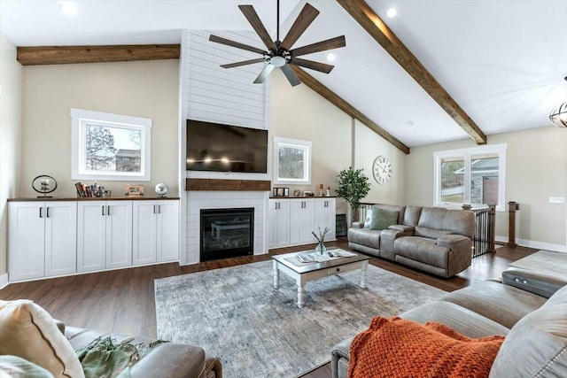 living room featuring high vaulted ceiling, beam ceiling, dark hardwood / wood-style flooring, and a fireplace