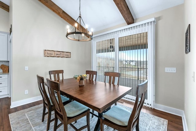 dining space featuring a chandelier, beamed ceiling, and dark wood-type flooring