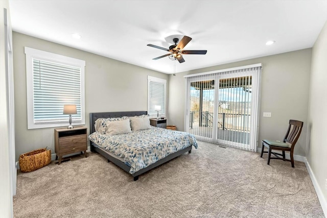 bedroom featuring carpet flooring, access to outside, and ceiling fan