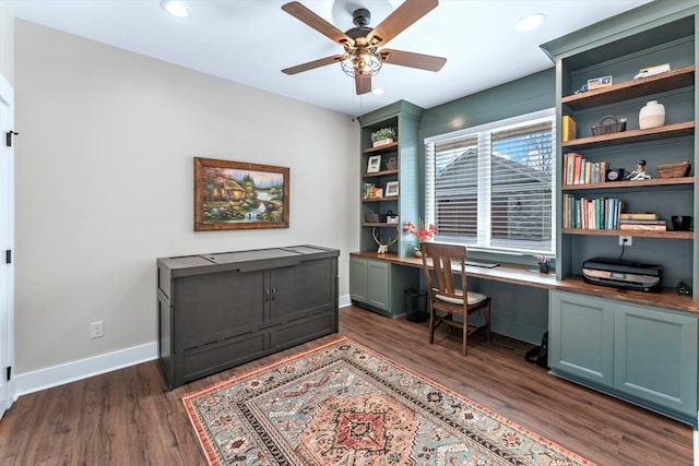 office area featuring dark hardwood / wood-style flooring and ceiling fan