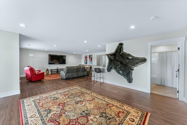 living room featuring dark hardwood / wood-style floors