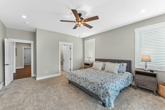 bedroom with ceiling fan and carpet flooring