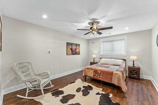 bedroom featuring dark wood-type flooring and ceiling fan