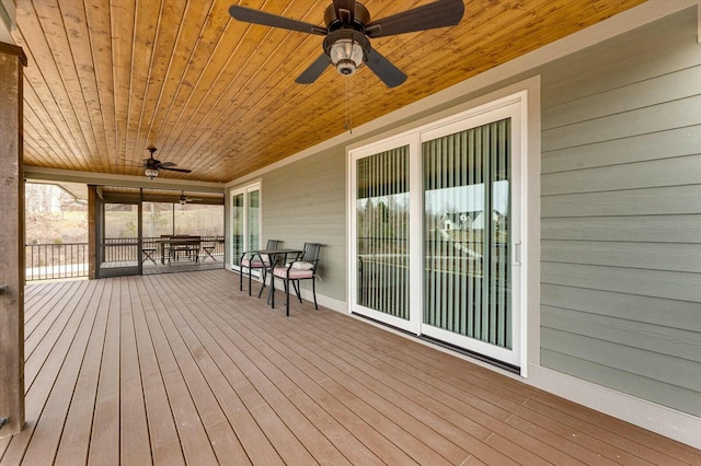 wooden terrace with ceiling fan