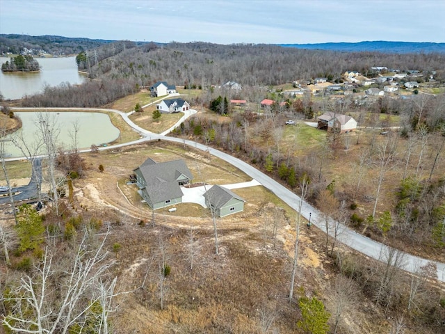 drone / aerial view featuring a water view