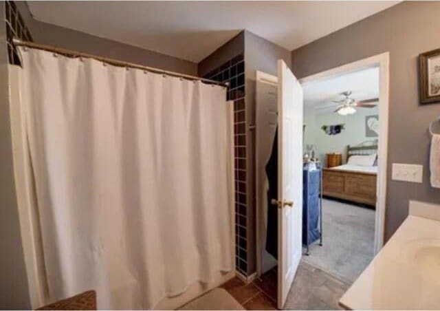 bathroom with tile patterned flooring and vanity