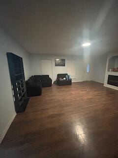 living room featuring dark hardwood / wood-style floors