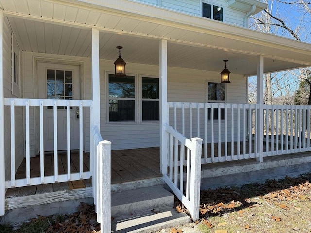 entrance to property featuring covered porch