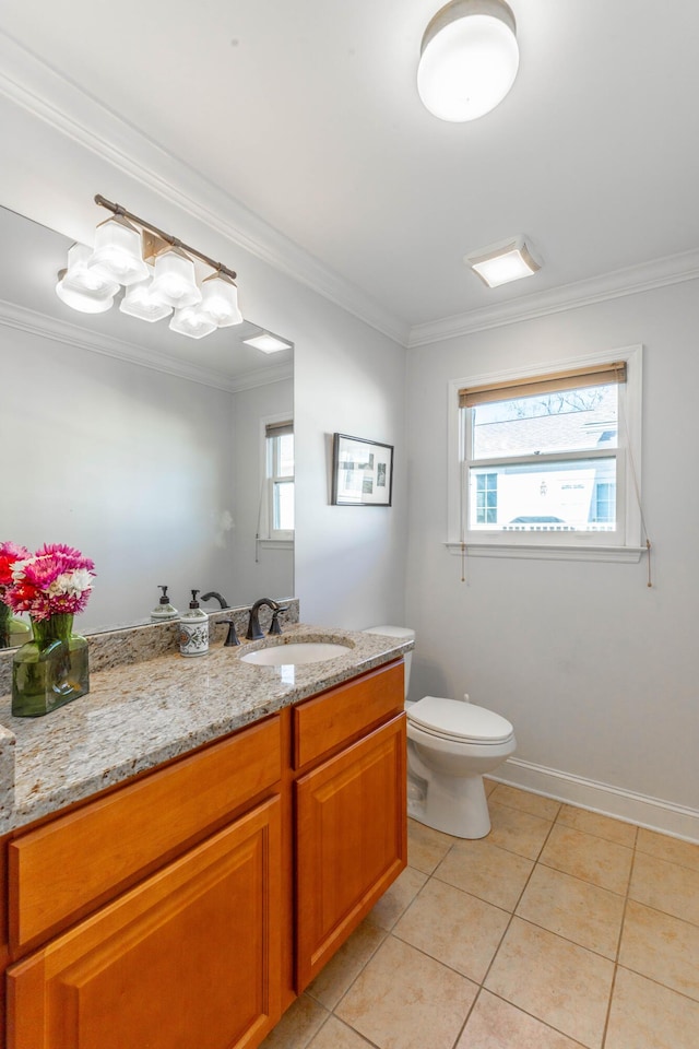 bathroom featuring tile patterned floors, plenty of natural light, and ornamental molding