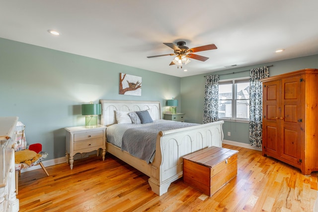 bedroom with visible vents, baseboards, recessed lighting, light wood-style flooring, and a ceiling fan