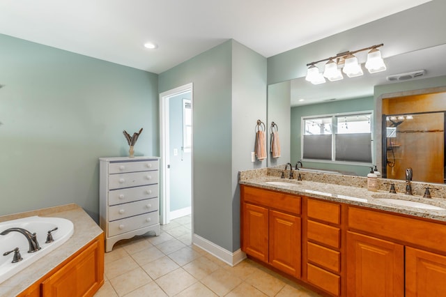 full bath featuring a tile shower, tile patterned flooring, a garden tub, and a sink