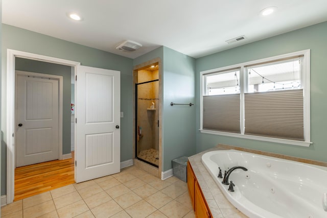 bathroom with visible vents, recessed lighting, a stall shower, a whirlpool tub, and tile patterned flooring