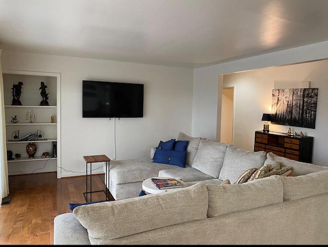 living room with wood finished floors