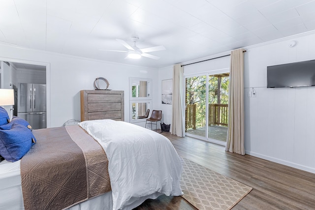 bedroom with a ceiling fan, access to exterior, ornamental molding, freestanding refrigerator, and dark wood finished floors