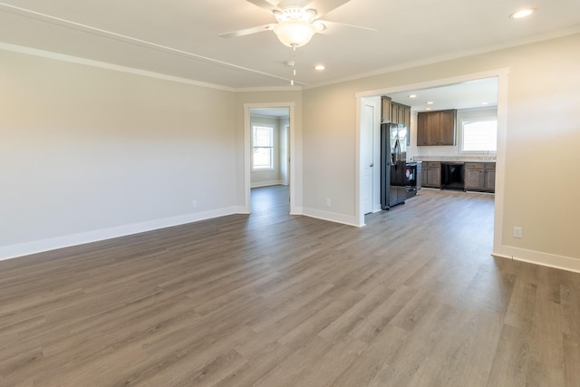 79 Bear Oak Dr, Dunlap, TN 37327 - unfurnished living room with crown molding, baseboards, ceiling fan, wood finished floors, and recessed lighting
