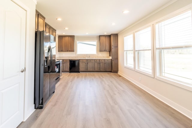 79 Bear Oak Dr, Dunlap, TN 37327 - kitchen featuring dishwasher, fridge with ice dispenser, light wood-type flooring, a sink, and brown cabinetry